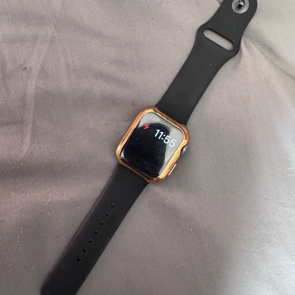 Apple Smartwatch with Black Band and Gold Frame